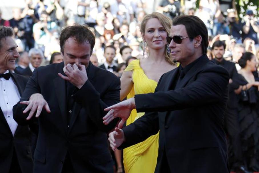 Sul red carpet del Festival del cinema di Cannes con Quentin Tarantino e John Travolta, 2014. (Reuters)